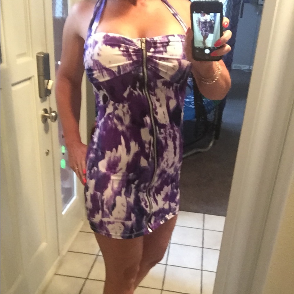 Purple and white dress by Aida.